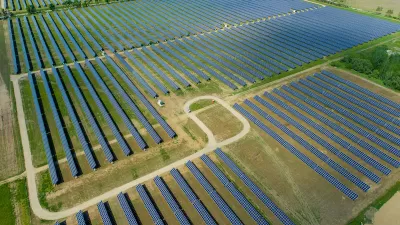 Aerial view of large solar panel installation in rural area in Indiana.