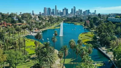 Downtown Los Angeles viewed from Echo Park with lake with artesian fountain in foreground.