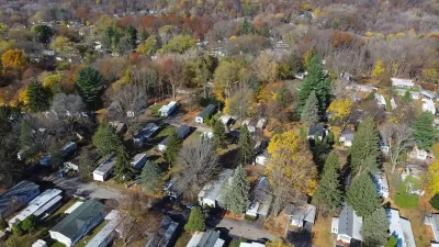 Aerial view of mobile home park with mature trees in Rochester, New York.