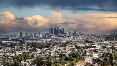 View from hilltop residential neighborhood of downtown Los Angeles, California on a cloudy day.