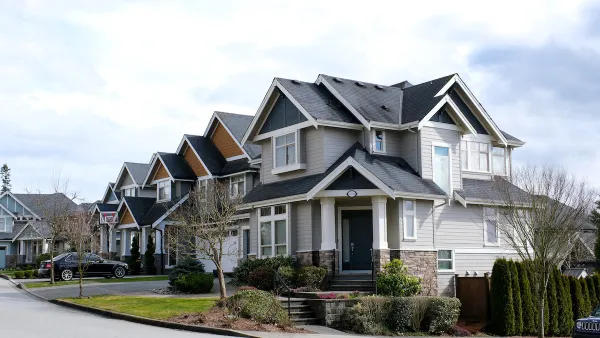 Two-story homes on residential street in Surrey, British Columbia, Canada.