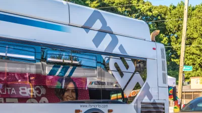 Close-up of front og MARTA public transit bus in Atlanta, Georgia with logo wrap