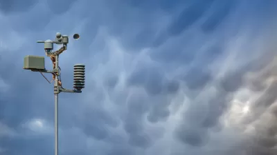 Weather station against stormy sky.