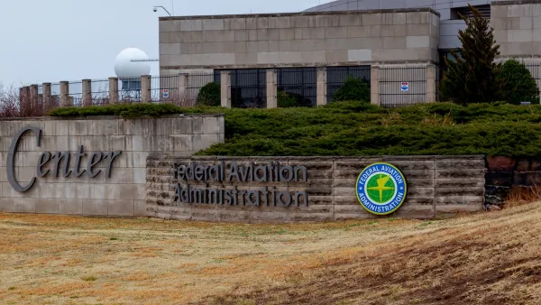 Concrete Federal Aviation Administration office building in Oklahoma City, OK on an overcast day.