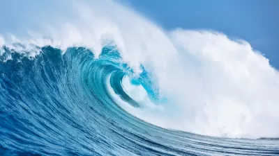 Large ocean wave cresting.