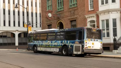 White and blue NJ Transit bus in Trenton, New Jersey.