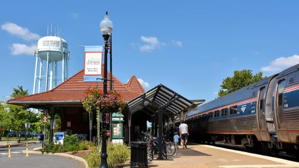 Train platform with red tile roof shelter in Manassas, Virginia.