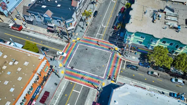 Aerial of rainbow painted crosswalks at large intersection in Castro District, Sna Francisco, California.