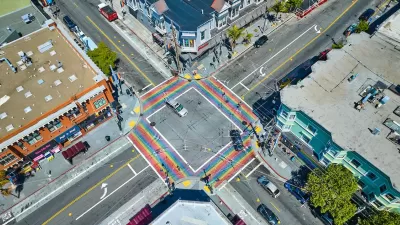 Aerial view of rainbow painted four-way crosswalk in the Castro district, San Francisco, California.