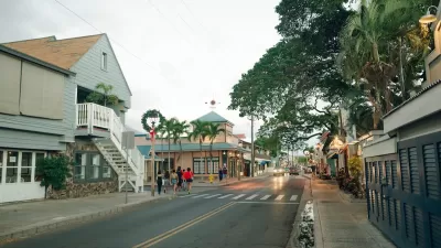 Street with two-story buildings in Lahaina, Maui, Hawaii.