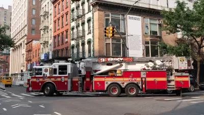 Red fire engine on street in Jersey City, New Jersey.