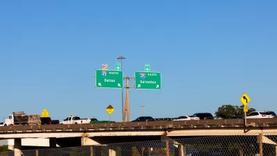 Traffic on Interstate 45 with signs leading to Dallas and Galveston.