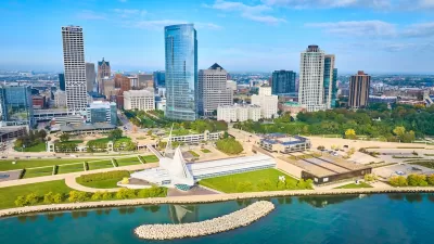 Aerial view of downtown Milwaukee, Wisconsin with Quadracci Pavilion on waterfront in foreground.