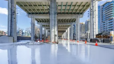 Skating rink under freeway in Bentway park in Toronto, Canada.