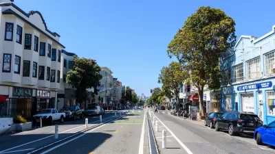 Center-running protected bike lane on Valencia Street in San Francisco, California.