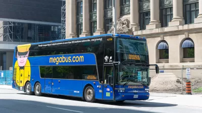 Blue Begabus bus on street in Toronto, Canada.