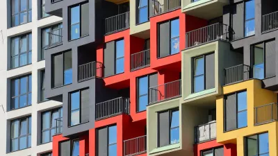 Colorful blocky apartment building facade.