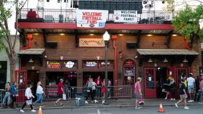 A bar is adorned in festive decorations for a college football game in Tuscaloosa, Alabama.