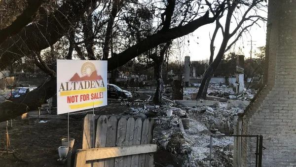 "Altadena - Not For Sale" yard sign in front of burned down house after Eaton Fire in Altadena, California in January 2025.
