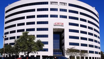 White multistory Austin Independent School District headquearters building in Austin, Texas.