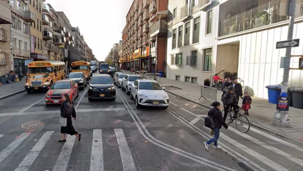 Google street view of Bedford Avenue in Brooklyn with pedestrians crossing a crosswalk and cyclist in the bike lane.