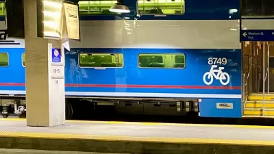 Blue Metra train bike car.