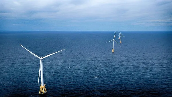 Three offshore windmills off the coast of Rhode Island.