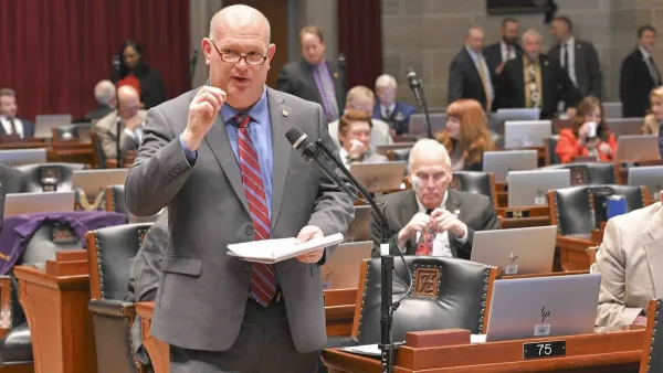 Missouri state Rep. Chris Brown speaking in government chamber.