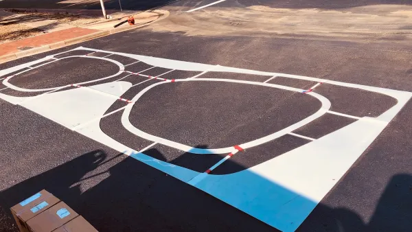 Crosswalk in Lubbock, Texas painted with Buddy Holly style glasses.