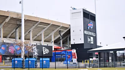 A football stadium, the home of the Buffalo Bills NFL team, is shown from the outside on a gloomy winter day.