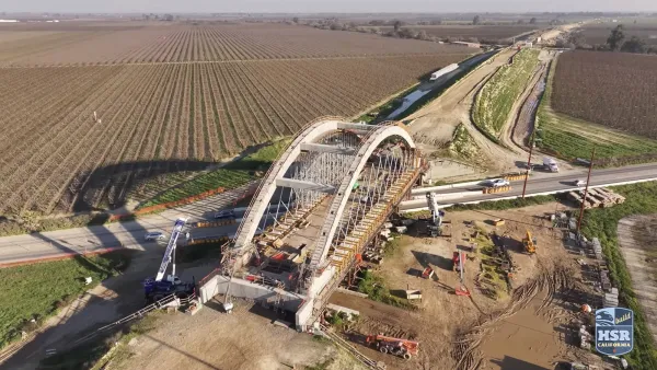 Arched bridge being built for high-speed rail track in Fresno County, California.