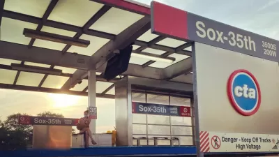 A rider waits on the platform of the Sox-35th station on the CTA Red Line in Chicago.