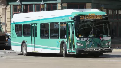 Teal Detroit public bus