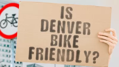 A sign reading "Is Denver Bike Friendly?" is pictured with no background.