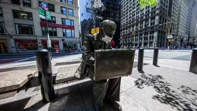 The sculpture of the "Double Check Businessman" in Liberty Park, New York City