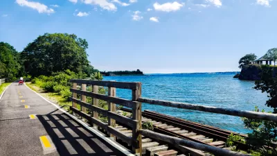 The East Bay Bike Lane runs along the water in Rhode Island.