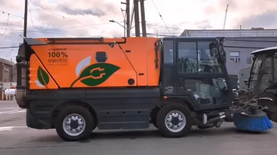Electric bike lane sweeping truck