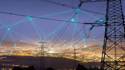 A grid of connected energy, shown as an imagined web over the night sky of an unnamed city.