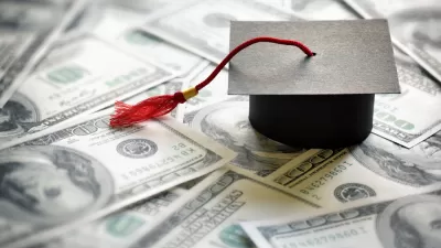 Graduation mortarboard on a pile of money.