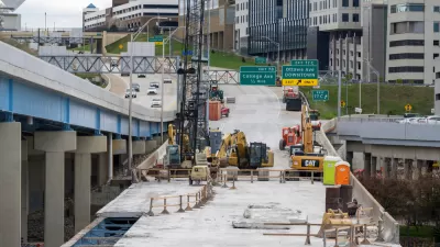 Construction work to replace the bridge deck carrying eastbound I-196 over Grand River in downtown Grand Rapids.