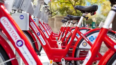 Close-up of red Houston BCycle bike share bikes parked at a station