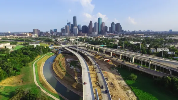 A view of Houston's freeways, with downtown in the background.