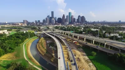 A view of Houston's freeways, with downtown in the background.