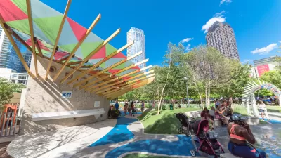 A children's play area is busy with kids and their parents in Downtown Dallas.