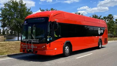 Red Lynx bus in operation on Vineland Avenue in Orlando, Florida in April 2021.