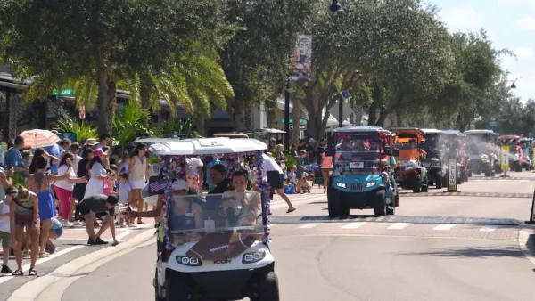 Labor Day golf cart parade on street in Babcock Ranch, Florida.
