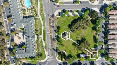 A aerial view of Ladera Ranch, California, showing a variety of buildings and open space.