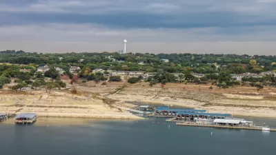 Lake TRavis is shown well below capacity, with the city of Austin in the background.