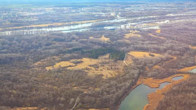 A aerial view of the Lobau floodplain, located to the north of Vienna, Austria and across the Danube River. Vienna is in the background.