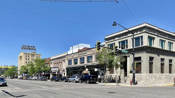 Main Street with two-story brick buildings in Bozeman, Montana.
